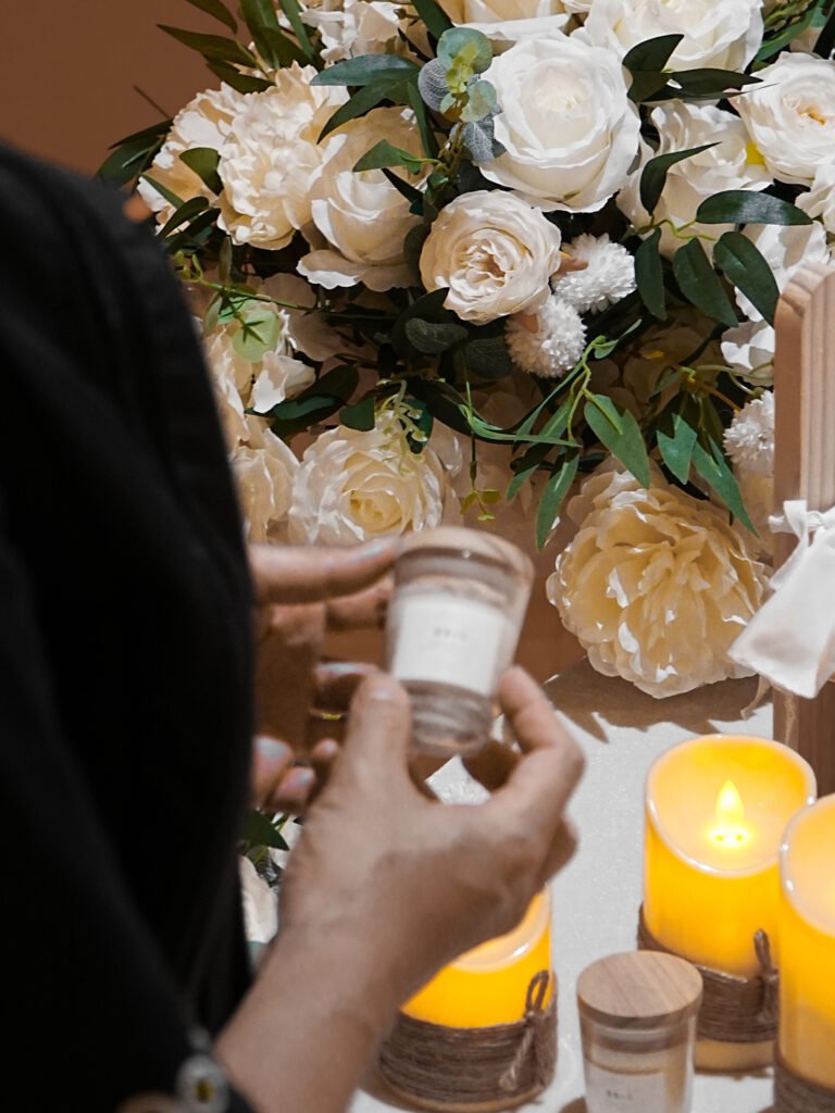 Furwell staff holding a glass pet memorial keepsake jar